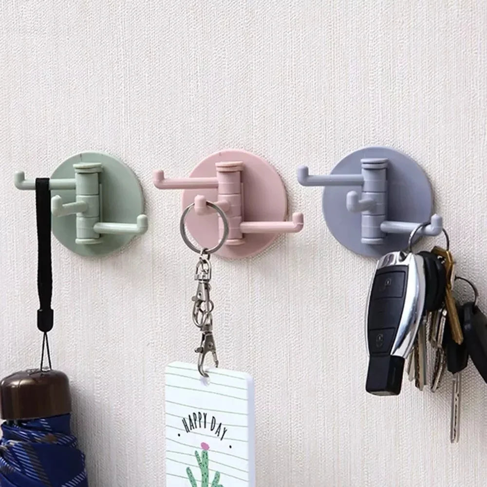 Three-arm folding adhesive key holder